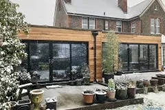 Hallmark-Glazed-Extensions-Black-Aluminium-Orangery-Cedar-Cladding-Hailsham-2