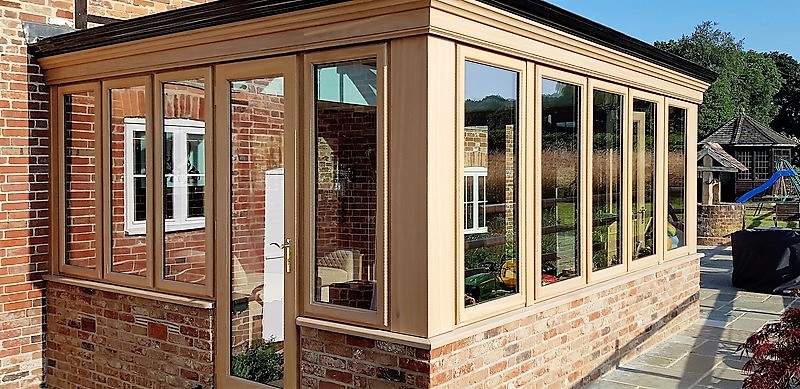 Hardwood orangery extension in Dorset Green Belt area